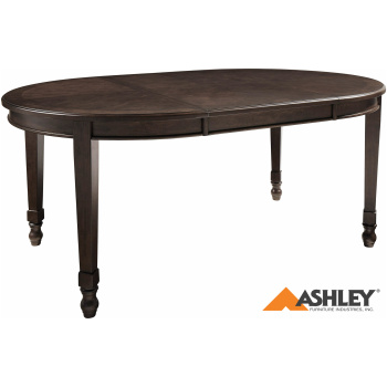 Ξύλινο οβάλ τραπέζι με επέκταση, της σειράς Adinton, από την Ashley®, σε σκούρα απόχρωση.