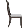 Ξύλινη καρέκλα της σειράς Adinton, από την Ashley, με ξύλινη ανατομική πλάτη και αφράτο μαξιλαρωτό κάθισμα.