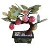 Ένα πρωτότυπο διακοσμητικό, με συλλεκτική αξία και σχετική σπανιότητα, που δείχνει ένα κλαρί με μήλα από νεφρίτη.