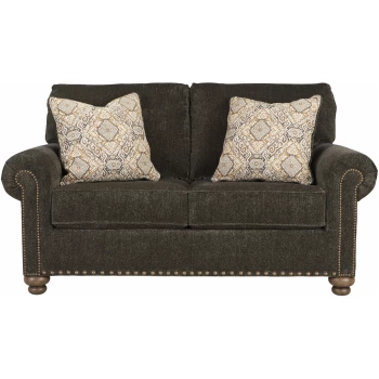 Διθέσιος καναπές της σειράς Stracelen, της Ahsley, επενδεδυμένος με βελούδινο ύφασμα σενίλ, σε σκούρο καφέ χρώμα. Στηρίζεται σε τέσσερα εμφανή πόδια.