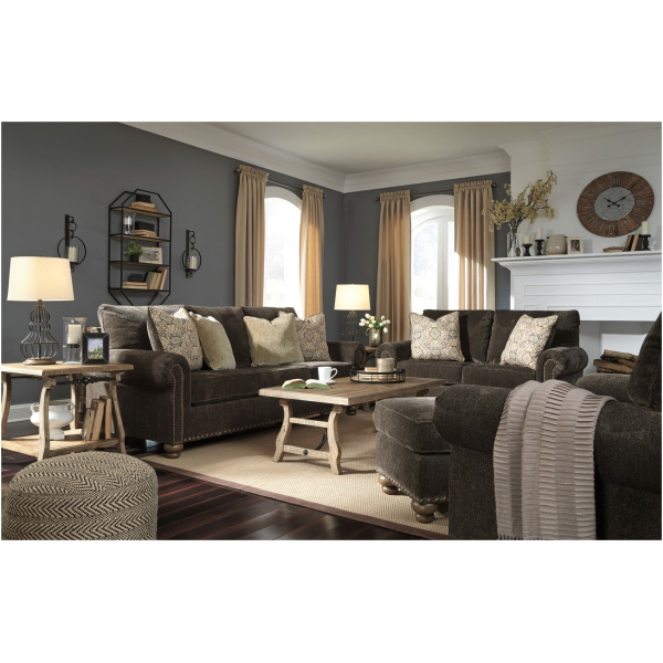 Τριθέσιος καναπές της σειράς Stracelen, της Ahsley, επενδεδυμένος με βελούδινο ύφασμα σενίλ, σε σκούρο καφέ χρώμα. Στηρίζεται σε τέσσερα εμφανή πόδια.