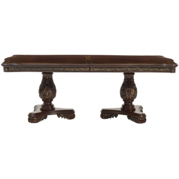 Τραπέζι ορθογώνιο επιβλητικό και επεκτεινόμενο, της Home Elegance. Στηρίζεται σε δύο φαρδείς σκαλιστούς άξονες, που καταλήγουν σε τρία πόδια.