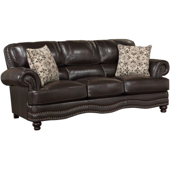 Ο τριθέσιος καναπές Milford, της Home Elegance, είναι σε καφέ σκούρο χρώμα και έχει σαν διακόσμηση τα εμφανή γαζιά και τους γυαλιστερούς καμπαράδες.