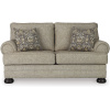 Αναπαυτικός διθέσιος καναπές, της σειράς Kananwood, της Ashley. Με αφράτα μαξιλάρια και ανθεκτική σενίλ ταπετσαρία, σε μπεζ χρώμα.